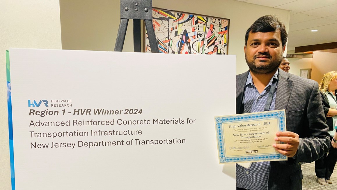 Giri Venkiteela, Research Project Manager, pictured here accepted the 2024 High Value Research Award for Region 1 on behalf of NJDOT.